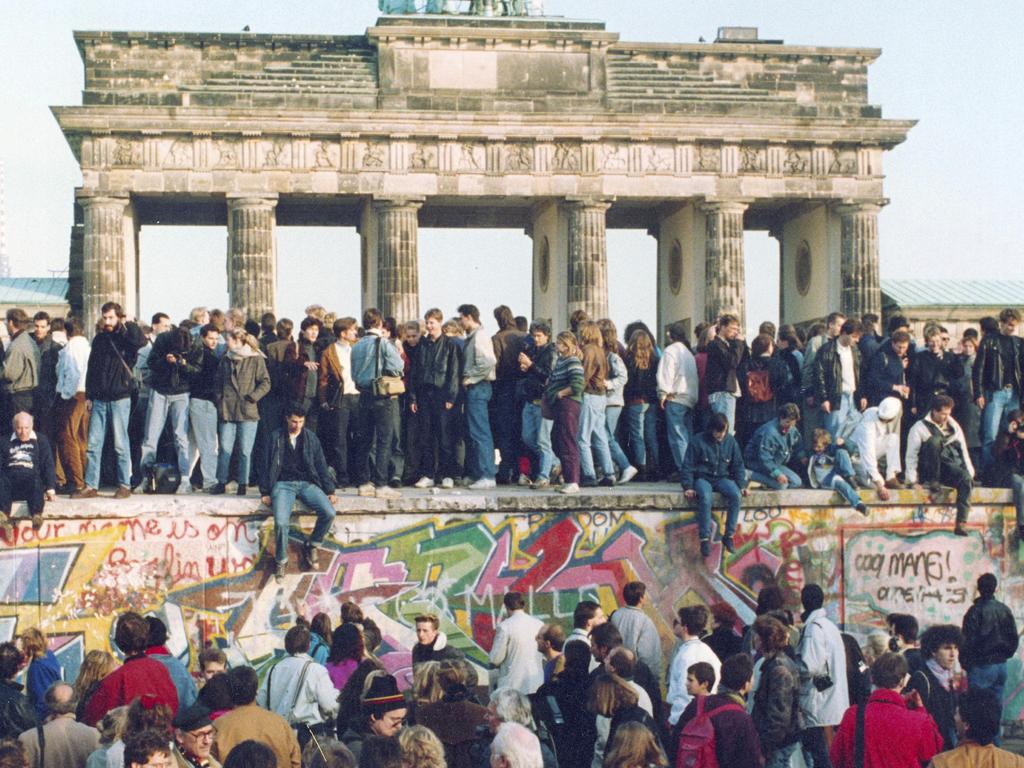 Thousands flock to the wall the day after Schabowski’s press conference, on November 10 1989. Picture: AP Photo, File.