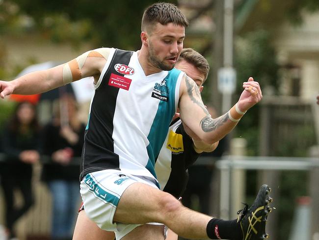 EDFL footy: West Coburg v Hillside: Zak Wunhym of Hillside kicks forwardSaturday, April 24, 2021, in Pascoe Vale South, Victoria, Australia. Picture: Hamish Blair