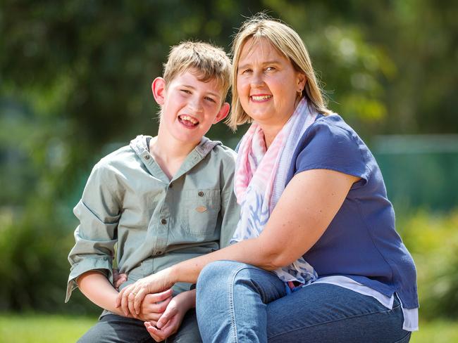 Ryan Holland, 13, with mother Joanne. Picture: Mark Stewart