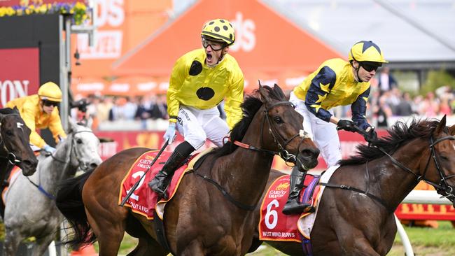 Mark Zahra celebrates after winning the Caulfield Cup aboard Without A Fight. Picture: Vince Caligiuri/Getty Images