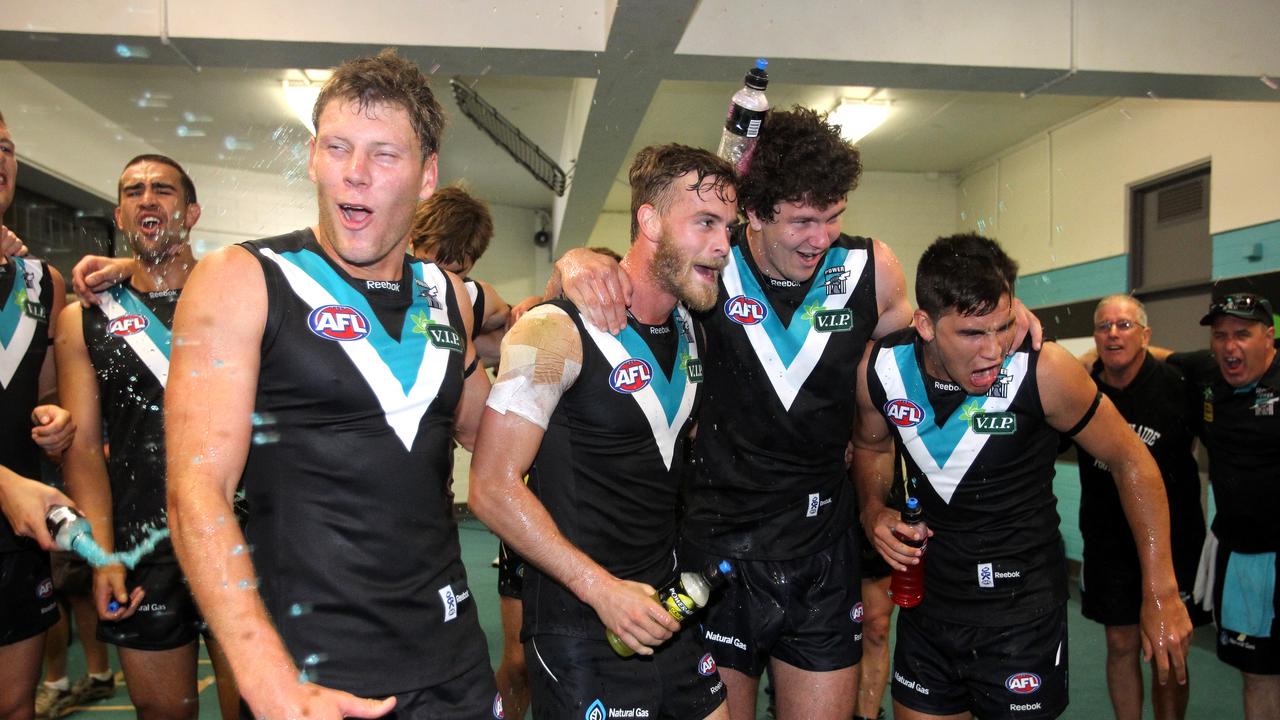 McCarthy with Brad Ebert, Jarrad Redden and Chad Wingard on their Port Adelaide debuts in 2012.