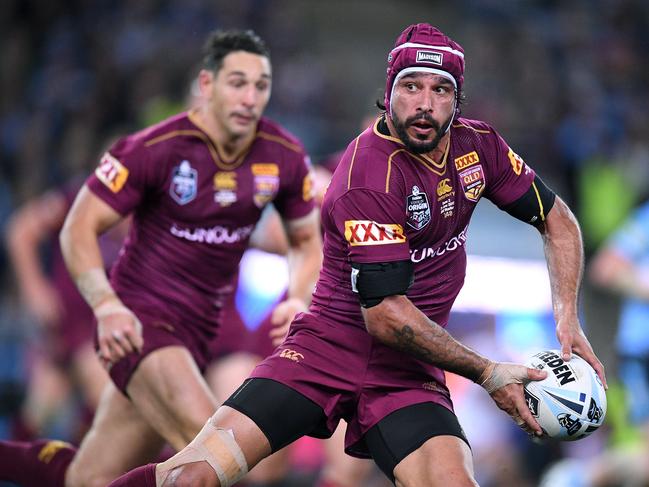 Johnathan Thurston of the Maroons looks to pass the ball during State of Origin Game II between the NSW Blues and Queensland Maroons, at ANZ Stadium in Sydney on Wednesday, June 21, 2017. (AAP Image/Dan Himbrechts) NO ARCHIVING, EDITORIAL USE ONLY