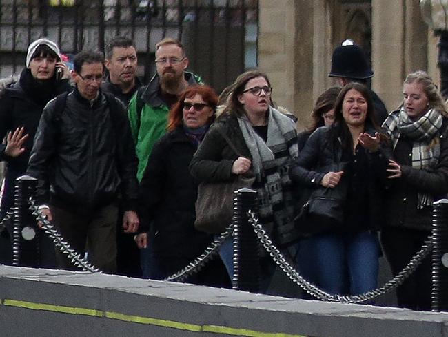People were evacuated from around Parliament. Picture: AFP