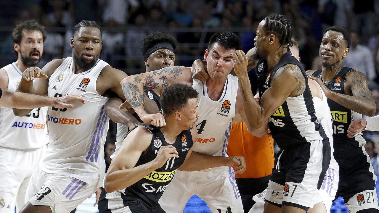 Players of Real Madrid and Partizan Mozzart Bet Belgrade fighting on court. Picture: Jesus Orihuela/Euroleague Basketball