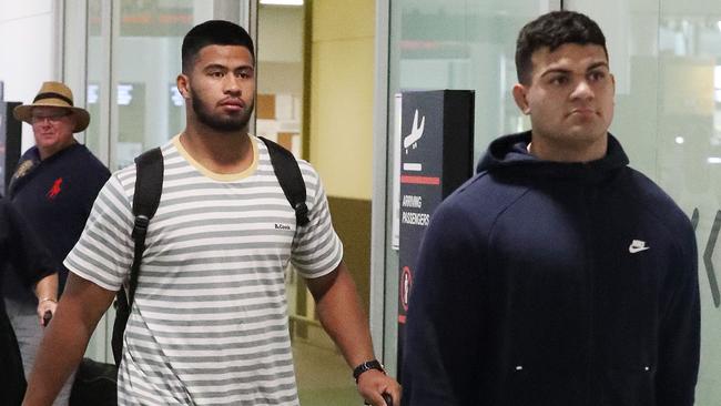 David Fifita and Payne Haas arrived back in Australia to a media storm. Picture: Liam Kidston.