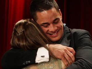 My mum, my rock...Jarryd Hayne hugs his mother Jodie after receiving the Dally M award. Picture: Brett Costello