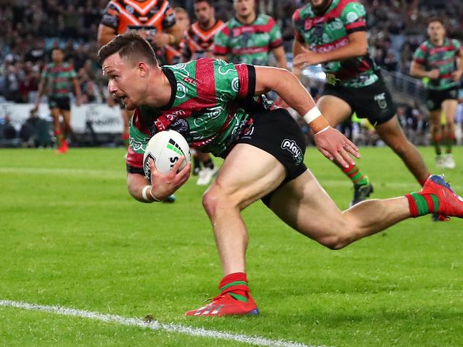 SYDNEY, AUSTRALIA - MAY 25: Damien Cook of the Rabbitohs scores a try during the round 11 NRL match between the South Sydney Rabbitohs and the Wests Tigers at ANZ Stadium on May 25, 2019 in Sydney, Australia. (Photo by Cameron Spencer/Getty Images)