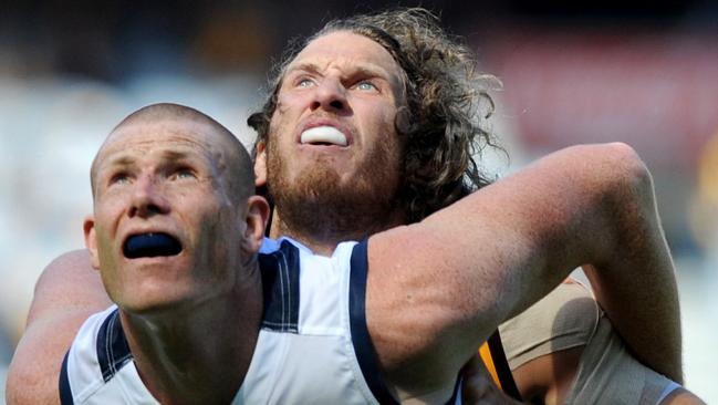 Sam Jacobs battles Hawthorn’s Ty Vickery at the MCG. Jacobs was huge — both physically and in influence — against the Hawks. Picture: Joe Castro (AAP)