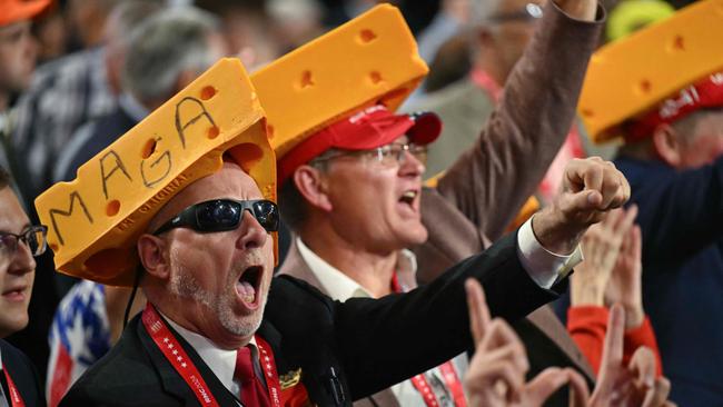 Wisconsin delegates wear their MAGA cheese hats and cheer on the last day of the 2024 Republican National Convention. Picture: Patrick T. Fallon / AFP)