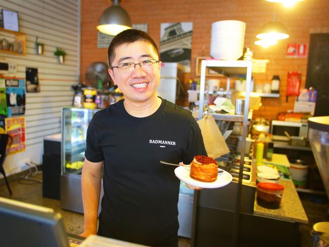 Badmanner Thymes Espresso owner Scott Sang with a red velvet cronut.                        <a class="capi-image" capiId="8f479d298daf23cac2348bc742685f7a"></a>