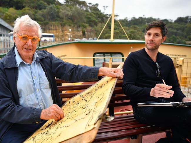 Lower north shore artists and ferry campaigners Peter Kingston and Alex Beech sketch aboard the Lady Northcott ferry on Sydney Harbour during the Festival of Mosman last Saturday. Picture: Joel Carrett