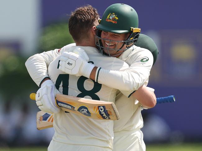 GALLE, SRI LANKA - JANUARY 30: Josh Inglis of Australia celebrates with Alex Carey after scoring a century during day two of the First Test match in the series between Sri Lanka and Australia at Galle International Stadium on January 30, 2025 in Galle, Sri Lanka.  (Photo by Robert Cianflone/Getty Images)