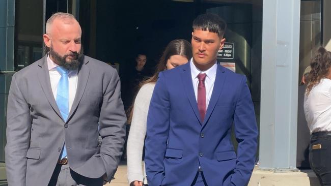 Jaman Rio (right) leaves Southport courthouse after receiving a suspended sentence for a one punch attack in a Surfers nightclub.