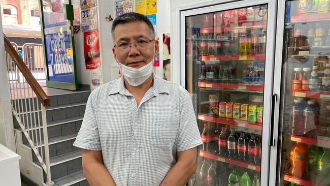 McWhirters retail body corporate chairman Andong Zhu inside his Lucky 1 convenience store.