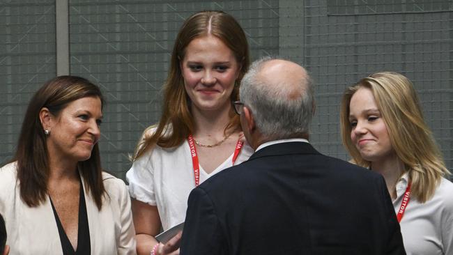 Jenny Morrison and daughters Abigail and Lily congratulate Scott Morrison after his valedictory speech.