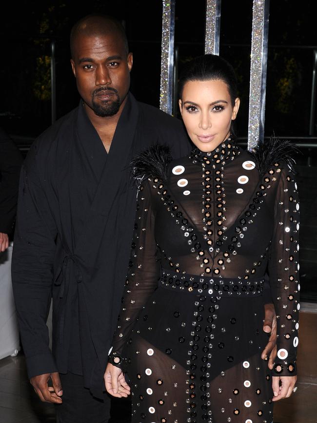 Kanye West and Kim Kardashian attend the 2015 CFDA Fashion Awards.