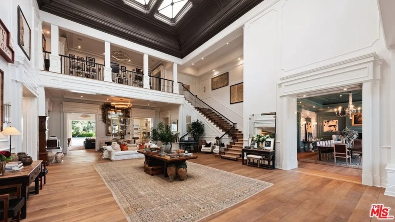 The mansion has a soaring double-story great room with elaborate skylights. Picture: Realtor.com