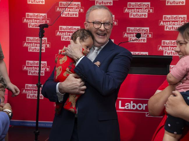 BRISBANE, AUSTRALIA - NewsWire Photos - DECEMBER 11, 2024:The Prime Minister Anthony Albanese holds baby Maise 3 months after delivering  a speech at the Morningside Panthers AFL club in Brisbane.Picture: NewsWire / Glenn Campbell