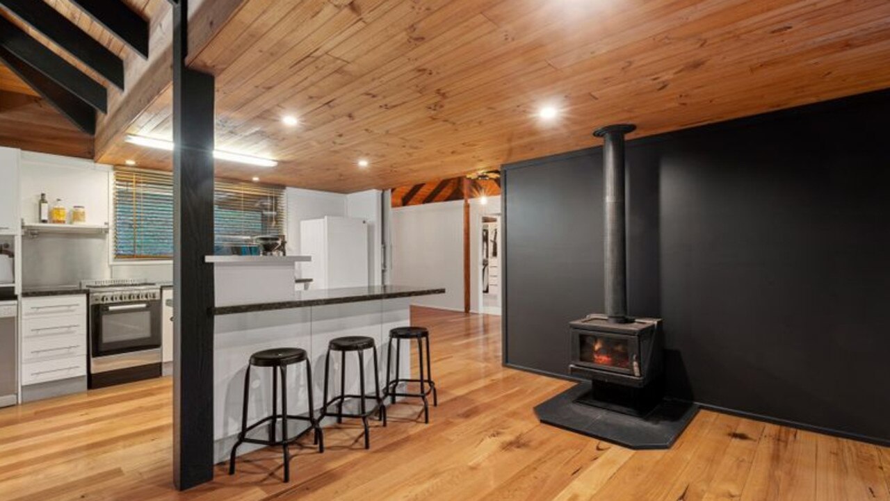 The kitchen and living area features a fireplace for those cool evenings.