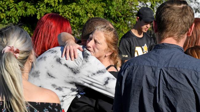 Zac Jones's mum Debbie is supported by family and friends at Loganholme as they honour the memory of her son. Picture: John Gass