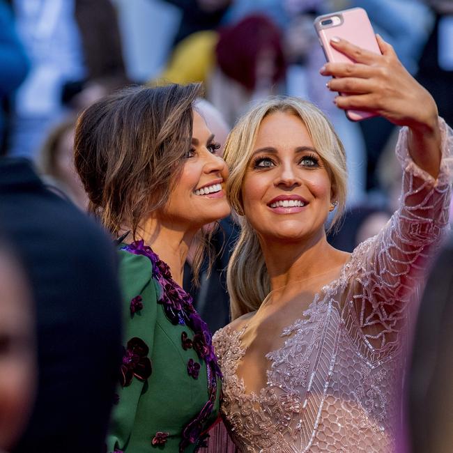 Lisa Wilkinson and Carrie Bickmore snapping a selfie at last year’s Logies.