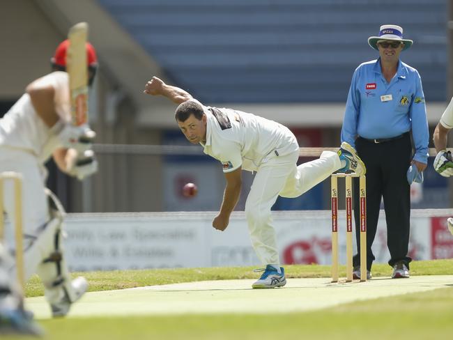 Langwarrin captain Travis Campbell goes at Sorrento opener Corey Harris in the MPCA Provincial grand final. Picture: Valeriu Campan