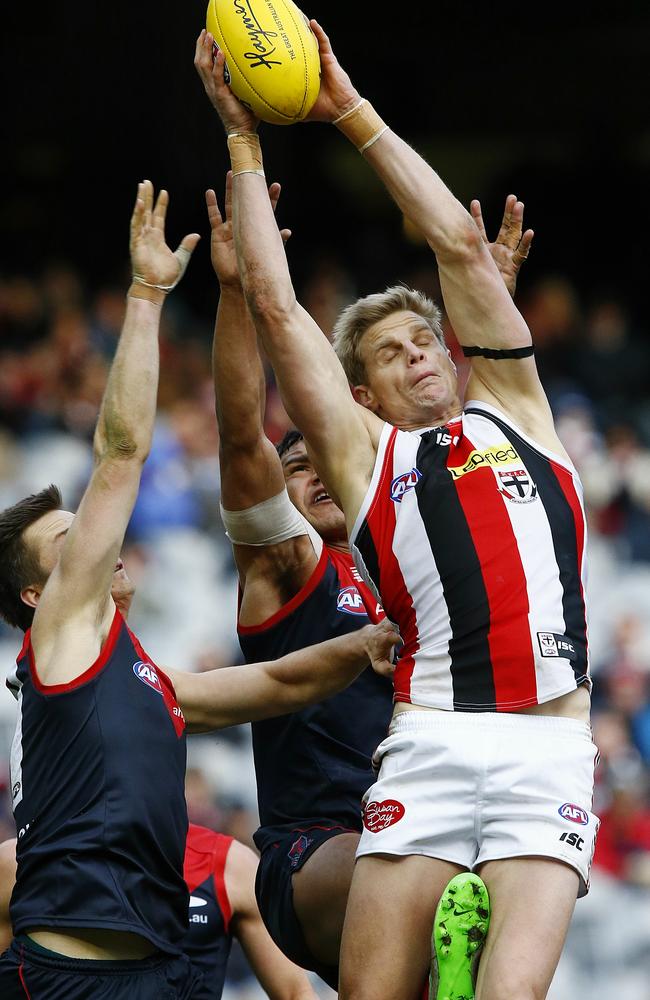 Nick Riewoldt completes a high mark in front of Neville Jetta and Jack Grimes. Picture: Wayne Ludbey.