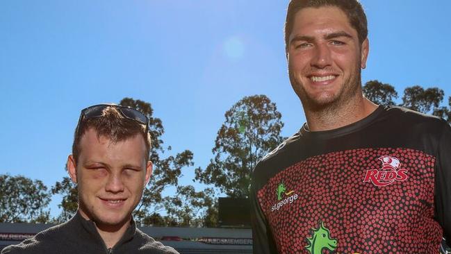 Horn receives an Indigenous Round jersey from Reds forward Rob Simmons. Photo: Brendan Hertel, QRU