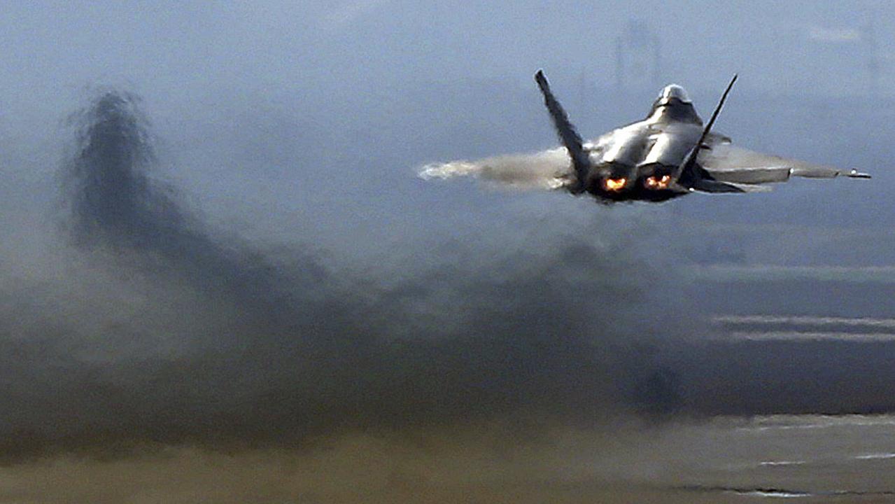 U.S. Air Force F-22 Raptor stealth fighter jet takes off from the runway during their military exercise at the Osan U.S. Air Base in Pyeongtaek, south of Seoul, South Korea, Wednesday, April 3, 2013. North Korea on Wednesday barred South Korean workers from entering a jointly run factory park just over the heavily armed border in the North in the latest sign that Pyongyang's warlike stance toward South Korea and the United States is moving from words to action. (AP Photo/Bae Jung-hyun, Yonhap) KOREA OUT