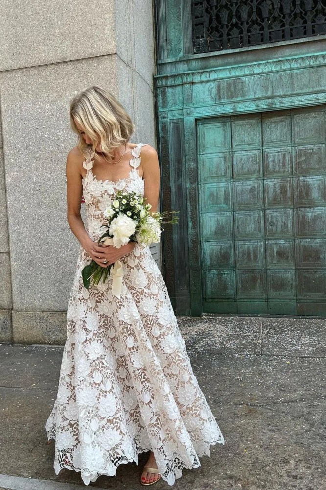 <p><i>Image credit: courtesy of Naomi Watts. </i><a href="https://www.vogue.com.au/brides/news/naomi-watts-wore-an-exquisite-white-lace-dress-for-her-new-york-courthouse-wedding/news-story/807aeb8105b70e837d2b603a46809629" target="_blank" rel="noopener"><i>From Naomi Watts wore an exquisite white lace dress for her New York courthouse wedding</i></a></p><h2><b>Naomi Watts in Oscar de la Renta</b></h2><p>Actress Naomi Watts wed Billy Crudup in a low-key courthouse ceremony, but still dressed up for the occasion, choosing a lace Oscar de la Renta gown. Together with an understated bouquet and gold sandals, she looked the picture of a summer bride&mdash;proof that looking chic on your big day doesn&rsquo;t need to involve a princess skirt or heels.&nbsp;</p><p><a href="https://www.newsletters.news.com.au/vogue"><i>Sign up to the Vogue newsletter</i></a></p>