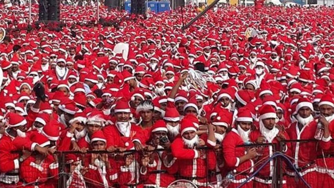 The largest gathering of people dressed as Santa.