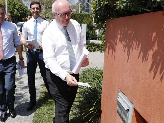 Federal Attorney-General George Brandis walks the neighbourhood to drop 'Yes' campaign pamphlets in New Farm, Brisbane. Picture: AAP