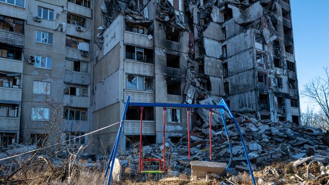 A swing set sits near a destroyed building in a section of Kharkiv that was heavily damaged by the Russians this month. Picture: Getty Images.