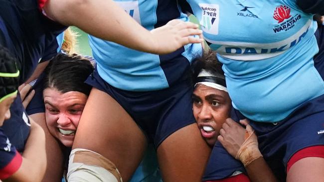 Sera Naiqama (right) of the Waratahs looks on in a scrum during the Round 1 Super W rugby match between the Melbourne Rebels Women and NSW Waratahs Women at AAMI Park in Melbourne, Friday, February 14, 2020. (AAP Image/Scott Barbour) NO ARCHIVING, EDITORIAL USE ONLY