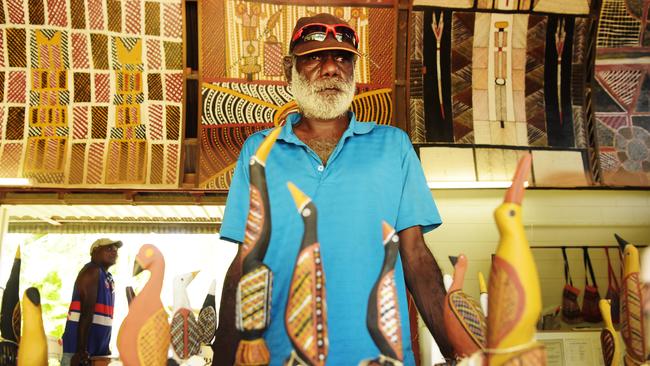 Local Artist Graham Tipungwnti showcases some of his artwork at the Ngaruwanajjiri Art Market in the Tiwi Islands Picture: Keri Megelus