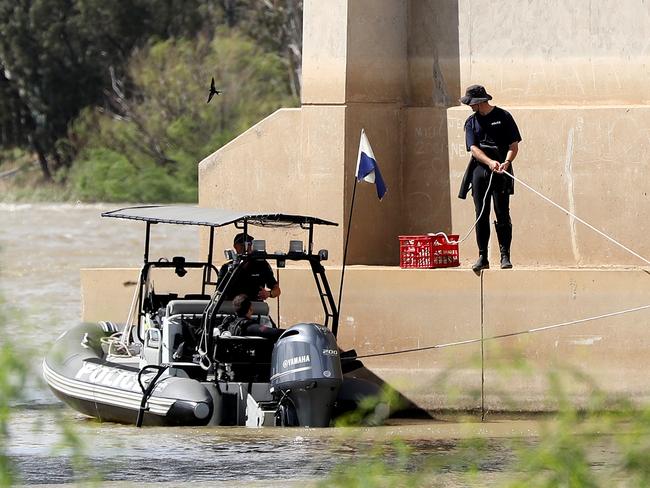 Police search the river for the man’s body. Pic: Calum Robertson