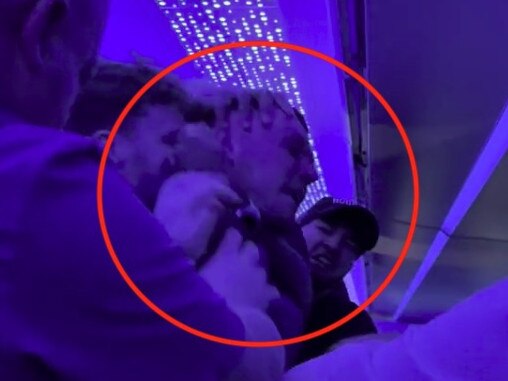 Story from Jam Press (Brit Plane Detained)   Pictured: A video grab of a plane passenger being detained by four men after getting drunk and abusive to cabin crew.  VIDEO: Brit plane passenger detained by four hero men after Ã¢â¬Ëgetting drunkÃ¢â¬â¢ and Ã¢â¬â¢abusive to cabin crewÃ¢â¬â¢  A plane passenger was detained by four fellow Brits after he allegedly got drunk and became abusive to the cabin crew.  The drama happened on the JetBlue flight from Gatwick Airport to New York JFK.  The men stepped in to help the airline staff who were struggling to get him to calm down.  One could be seen holding him around the neck to try and restrain him, but he tries to wriggle free.  A woman, thought to be the manÃ¢â¬â¢s girlfriend, asked the man holding him to remove his finger from near his eye.  She called him Ben and said: Ã¢â¬ÅPlease get that off of his face.Ã¢â¬Â  He replied: Ã¢â¬ÅI canÃ¢â¬â¢t just leave him.Ã¢â¬Â  She adds: Ã¢â¬ÅNo, no, no listen, donÃ¢â¬â¢t tell me to stop.Ã¢â¬Â  A fellow flyer tells her: Ã¢â¬ÅMove back now.Ã¢â¬Â  She responds: Ã¢â¬ÅBen, Ben stop fighting them. Stop fighting them.Ã¢â¬Â  As the man attempts to escape from them, one declares: Ã¢â¬ÅRight take him down.Ã¢â¬Â  The woman can be heard saying: Ã¢â¬ÅNoÃ¢â¬Â and starts sobbing.  The group manage to restrain him and then move him down the plane aisle where two cabin crew members are.  One passenger exclaims: Ã¢â¬ÅJesus Christ.Ã¢â¬Â  While another said: Ã¢â¬ÅWhat the f*ck.Ã¢â¬Â  One man appears to try and reassure a child adding: Ã¢â¬ÅDonÃ¢â¬â¢t worry IÃ¢â¬â¢m right here.Ã¢â¬Â  The flight took off from Gatwick at 11:55 am and arrived on time at 3:15 pm on Tuesday (30 Jan).  Another Brit, Grant Saunders, who works as a hypnotist, was on the flight.  He said: Ã¢â¬ÅThe men from the back of the plane came down to assist.  Ã¢â¬ÅThey eventually tackled him to the floor.  Ã¢â¬ÅI felt sorry for elderly couples who were sitting around where it was happening.  Ã¢â¬ÅThe lads got a round of applause as they left.Ã¢â¬Â  He claimed: Ã¢â¬ÅThe man was drunk and was getting loud and aggressi