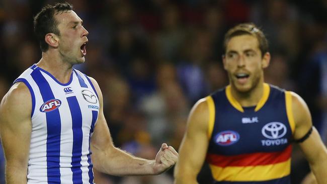 MELBOURNE, AUSTRALIA - MARCH 26: Todd Goldstein of the Kangaroos celebrates a goal during the round one AFL match between the North Melbourne Kangaroos and the Adelaide Crows at Etihad Stadium on March 26, 2016 in Melbourne, Australia. (Photo by Michael Dodge/Getty Images)