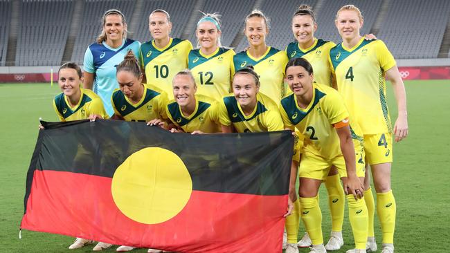 The Matildas with the Aboriginal flag before a game at the Olympics in Tokyo in July 2021. Picture: Yoshikazu Tsuno/AFP