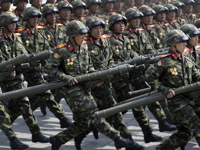 Soldiers carry rockets during a military parade in Pyongyang, North Korea. Picture: AP