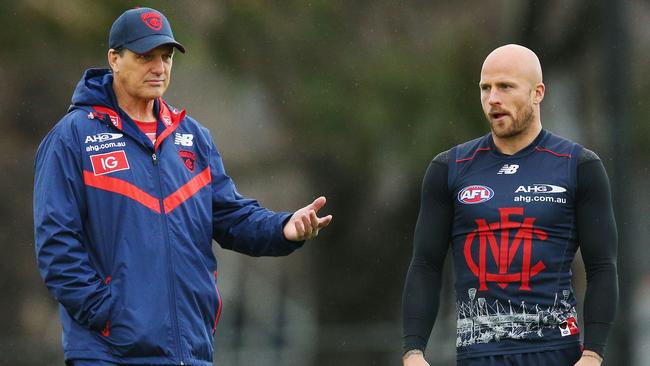 Roos and then Demons captain Nathan Jones in 2016. Picture: Michael Dodge/Getty Images