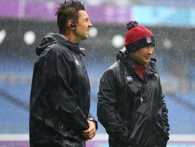 England coach Eddie Jones and his assistant Scott Wisemantel (L) at the World Cup in Japan.