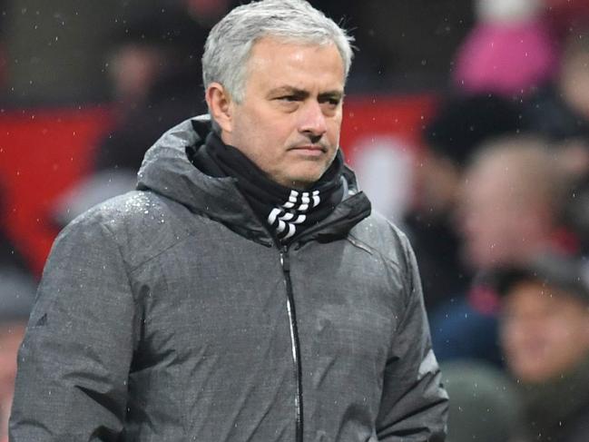 Manchester United's Portuguese manager Jose Mourinho leaves the pitch at the end of the English Premier League football match between Manchester United and Huddersfield Town at Old Trafford in Manchester, north west England, on February 3, 2018. / AFP PHOTO / Paul ELLIS / RESTRICTED TO EDITORIAL USE. No use with unauthorized audio, video, data, fixture lists, club/league logos or 'live' services. Online in-match use limited to 75 images, no video emulation. No use in betting, games or single club/league/player publications.  /