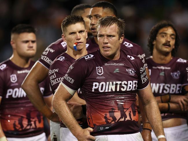 SYDNEY, AUSTRALIA - APRIL 23: Jake Trbojevic of the Sea Eagles and his team look dejected after a try during the round eight NRL match between Wests Tigers and Manly Sea Eagles at Campbelltown Stadium on April 23, 2023 in Sydney, Australia. (Photo by Mark Kolbe/Getty Images)