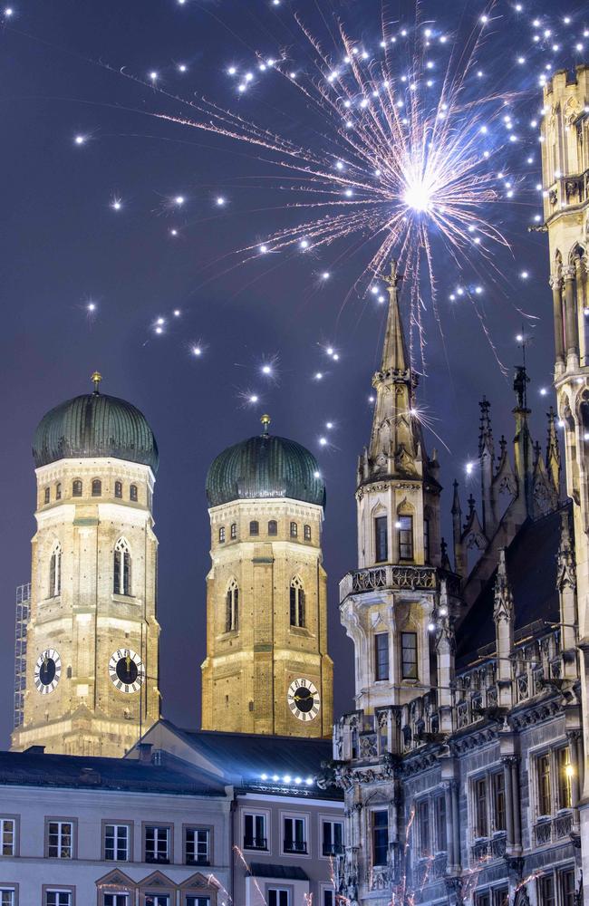 Fireworks explode over the Frauenkirche cathedral on December 31, 2018 during the New year's eve celebrations in Munich, southern Germany. Picture: AFP