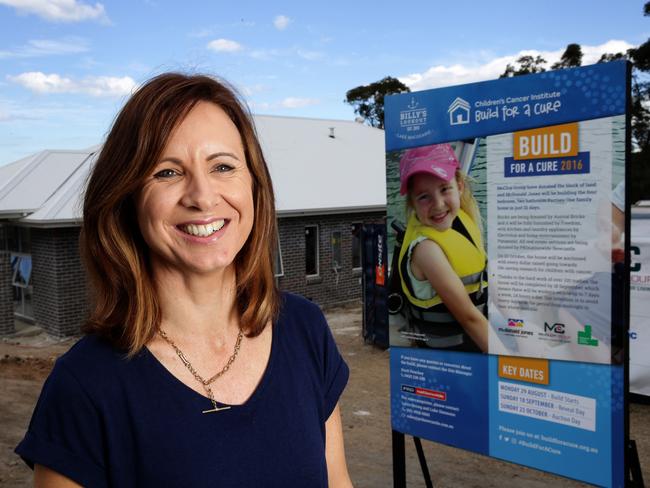 Campaigner Melissa Carr out the front of the “Build for a Cure” house, a building project in Lake Macquarie to help raise more funds. Picture: Peter Lorimer