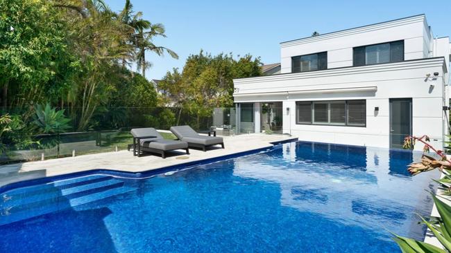 The luxurious swimming pool and backyard of the Vaucluse mansion.