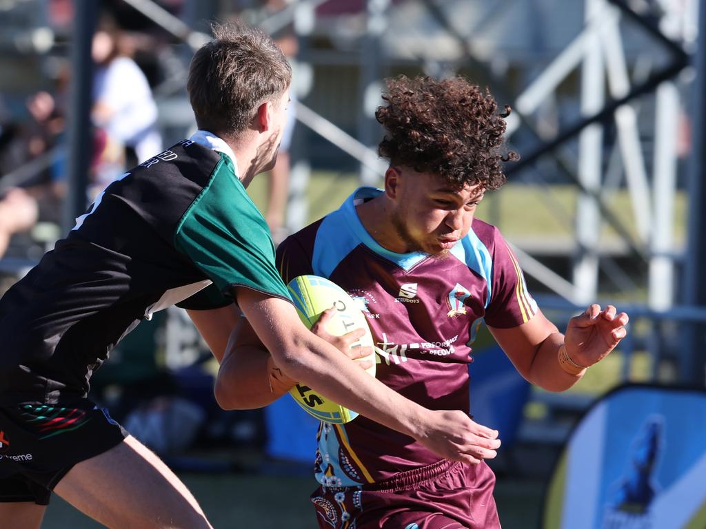 Titans Cup Finals. Tweed River High (green and Black) v Keebra Park (blue) in Open Boys Development division at Southport Tigers . Picture Glenn Hampson.