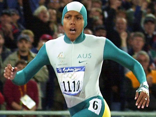 Cathy Freeman powers over the finish line in the 400m final at the Sydney Olympic Games. Picture: Patrick Hertzog/AFP