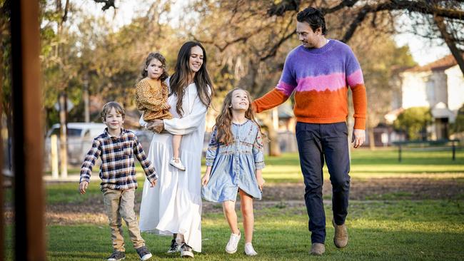 Christiane and James Duigan, with Charlotte, 7, Leonardo, 5, and Rafaella, 2, in Adelaide, are planning to base themselves in Byron Bay. Picture: Mike Burton